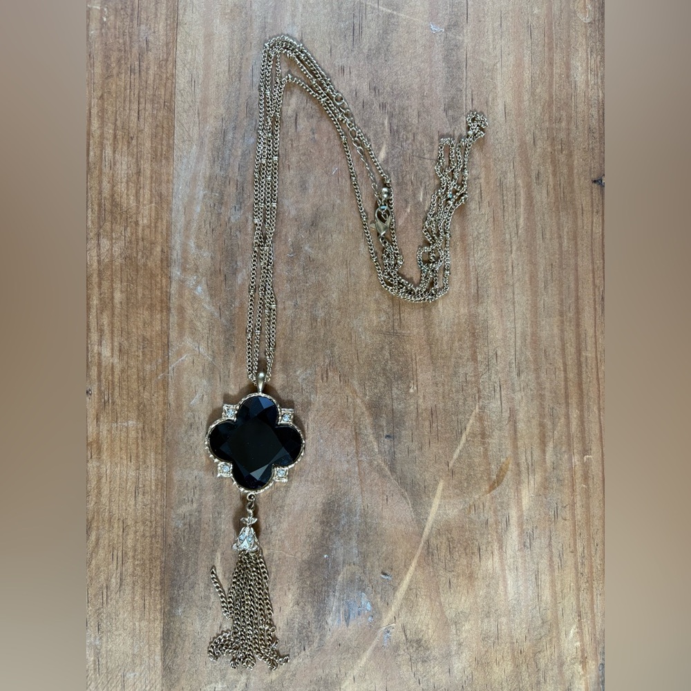 Gold Tassel Necklace with Black Clover Pendant – Glam & Chic